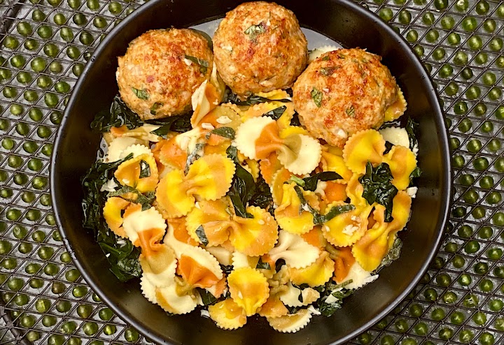 CHICKEN SAGE MEATBALLS with PUMPKIN FARFALLE, KALE & FRESH HERB WHITE WINE SAUCE