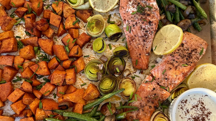 SHEET PAN ROASTED INDIAN SPICED WILD CAUGHT SALMON with SWEET POTATOES, LEEKS & LEMON TAHINI SAUCE